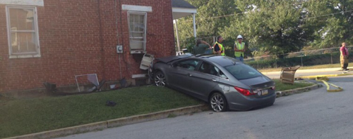 Car Crashes Into Structure